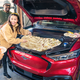 Image for article titled Here Are Some Horrible Things You Can Cram In The Ford Mustang Mach-E's Frunk
